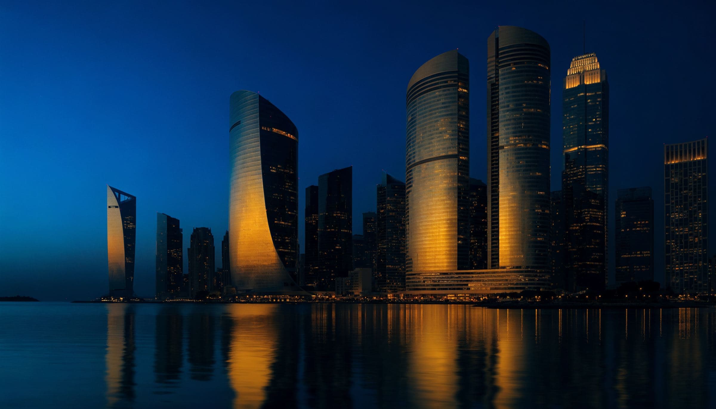 Skyline at dusk in deep blue and gold